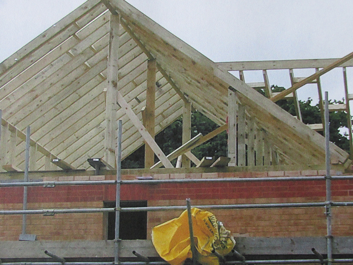 New roof timbers being fitted during a loft conversion